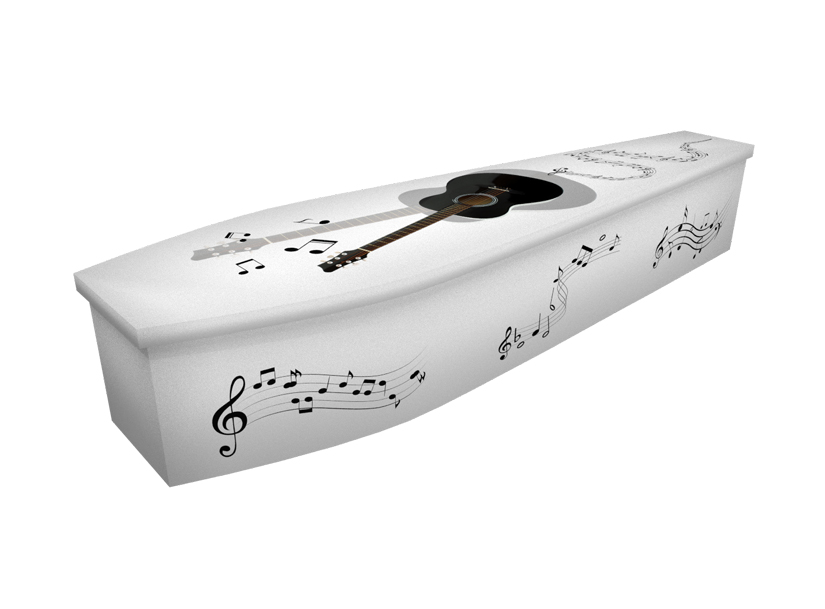 Cardboard coffin with an image of a black guitar and musical notes