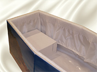 Crem film lining with a satin frill and cardboard headrest