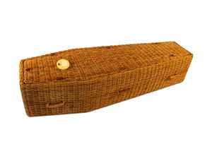 woven coffin made from golden wicker