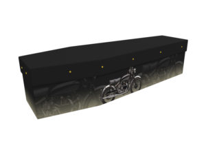 Cardboard coffin with an image of a black motorbike